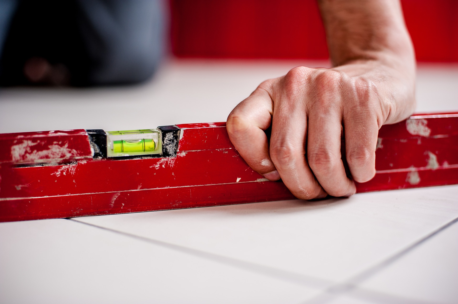 man checing the tiles